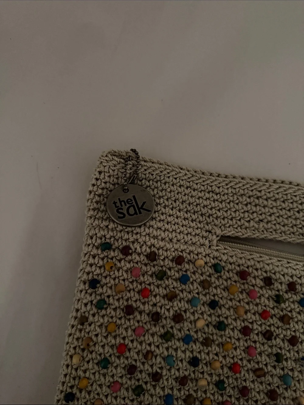 The Sak Cream Crochet Clutch with Multicolor Studs